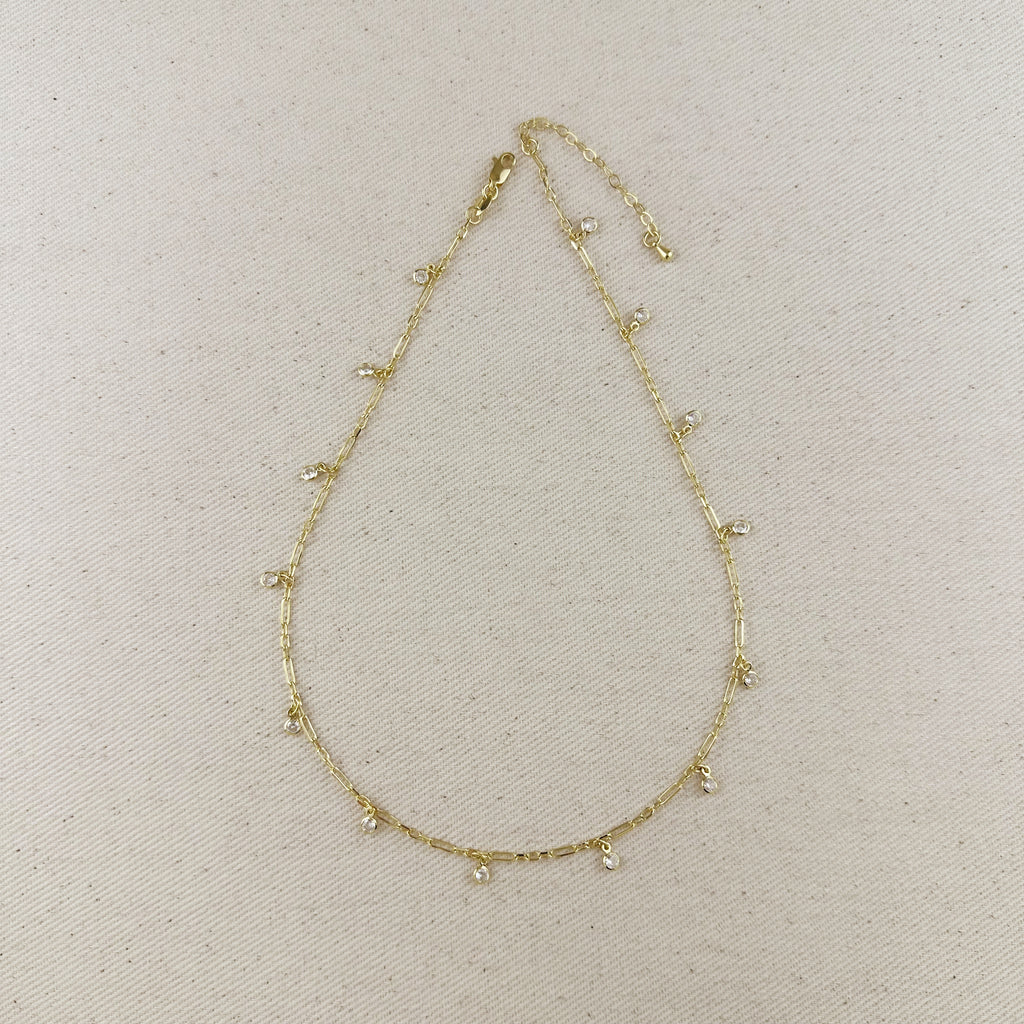 18K gold filled paperclip chain necklace with bezel CZ drops for a modern and elegant look.