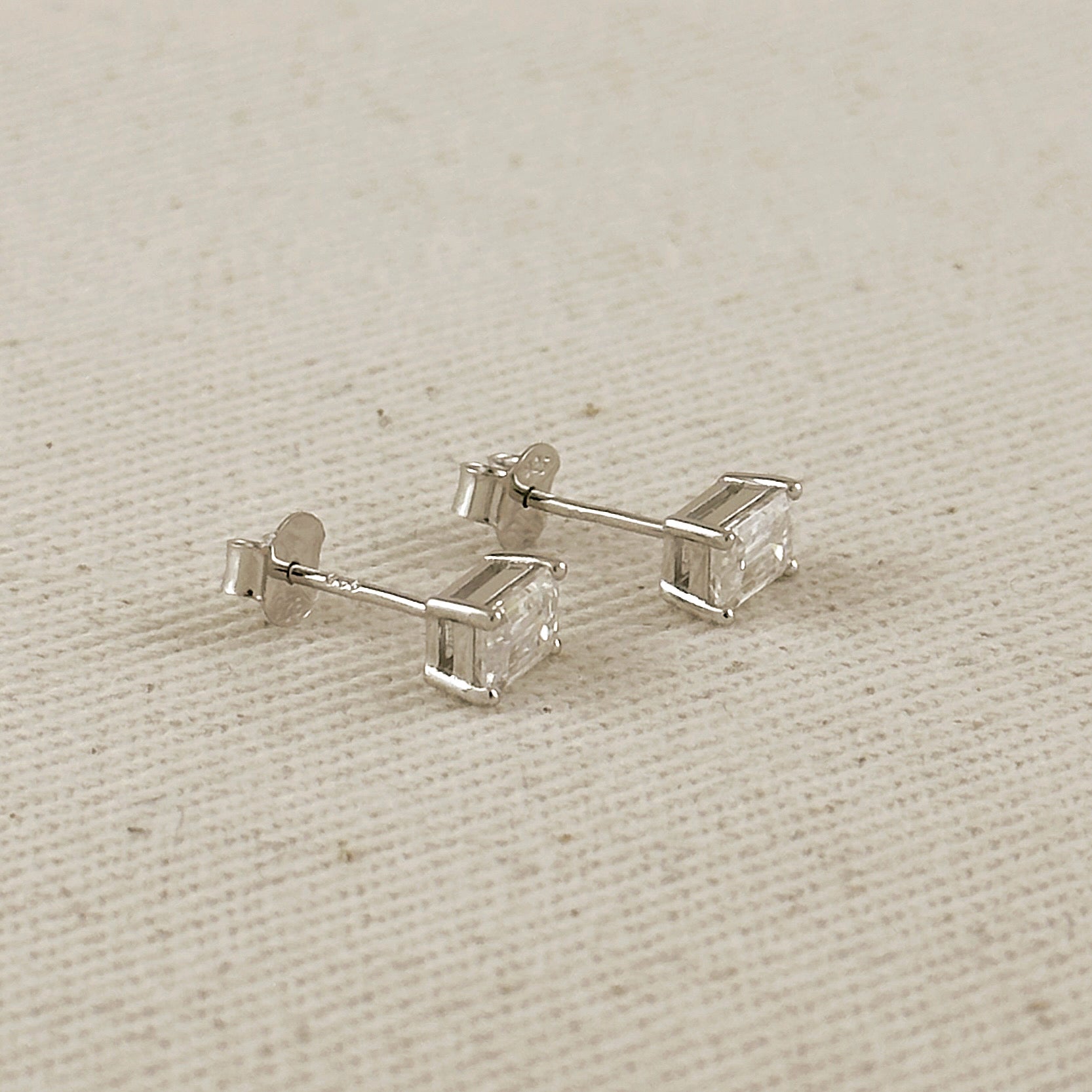 .925 Sterling Silver Rhodium Plated Moissanite Baguette Stud Earrings