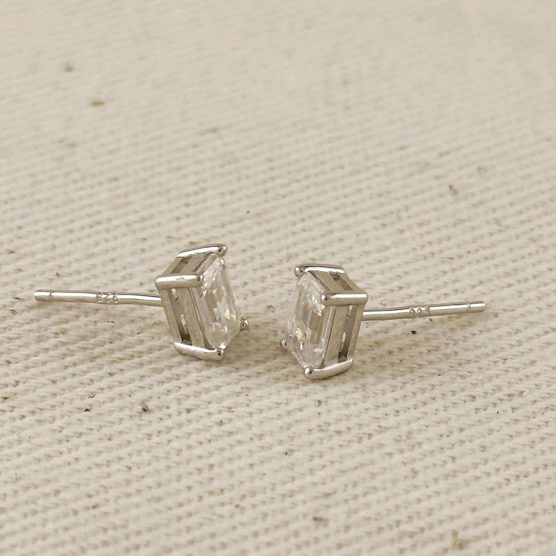 .925 Sterling Silver Rhodium Plated Moissanite Baguette Stud Earrings