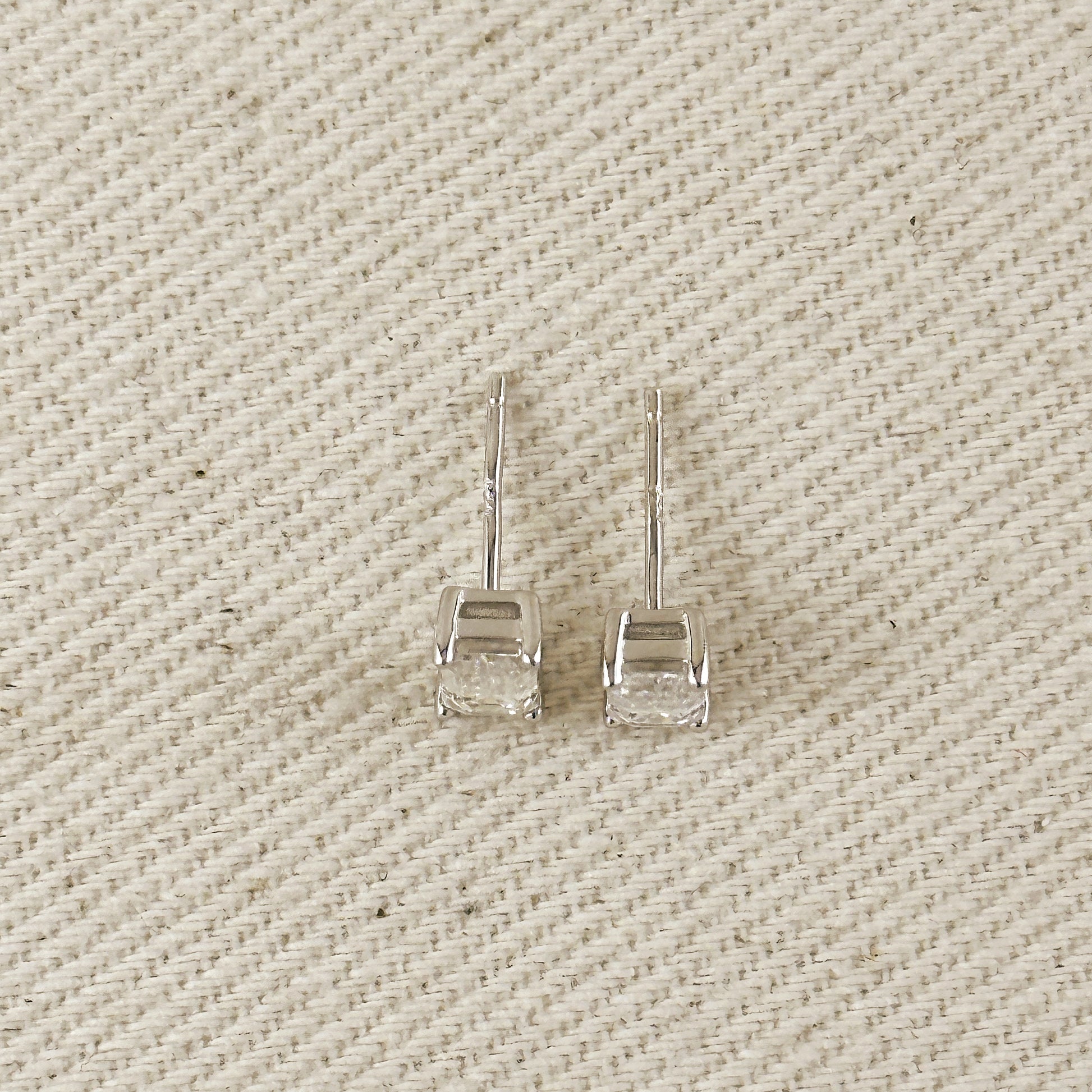 .925 Sterling Silver Rhodium Plated Moissanite Baguette Stud Earrings