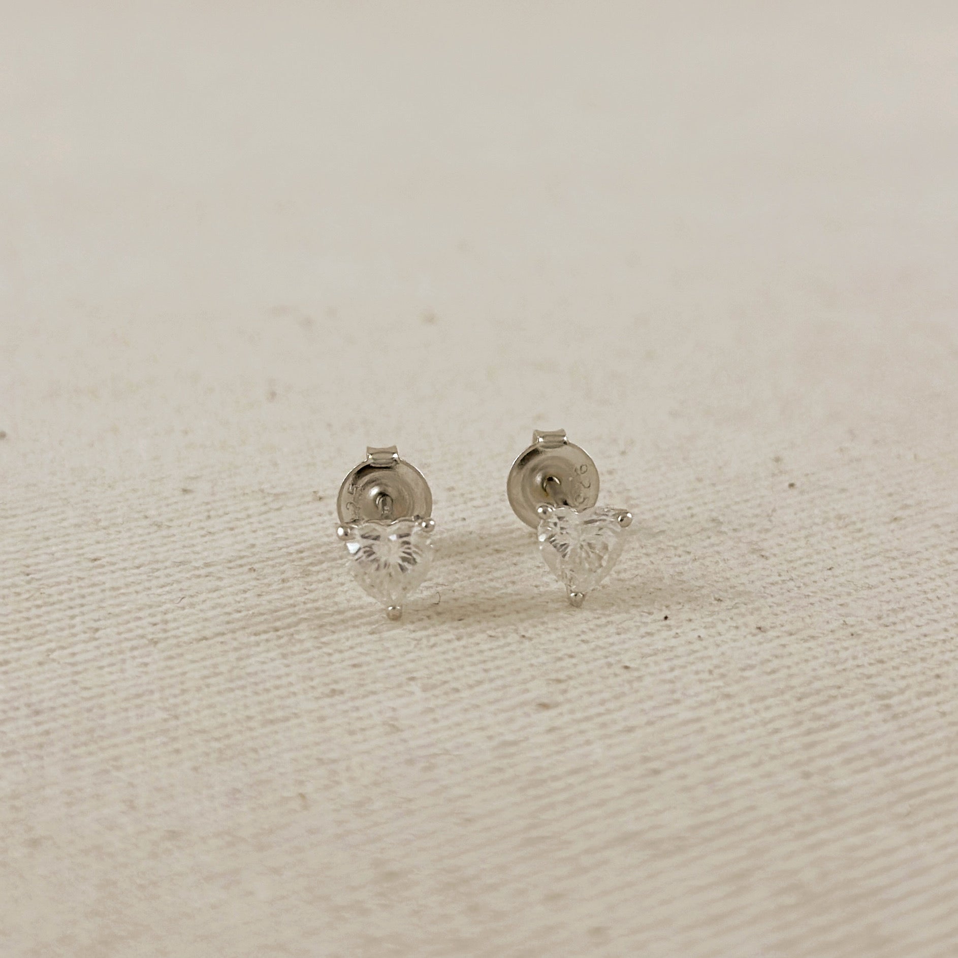 .925 Sterling Silver Rhodium Plated Moissanite Heart Stud Earrings