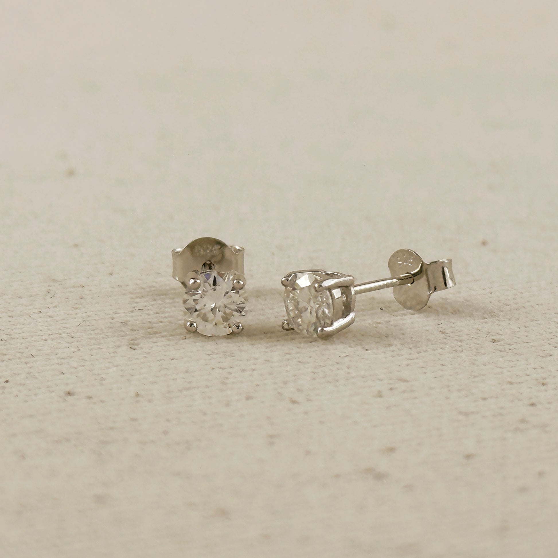 .925 Sterling Silver Rhodium Plated 5.0 mm Round Cut Moissanite Stud