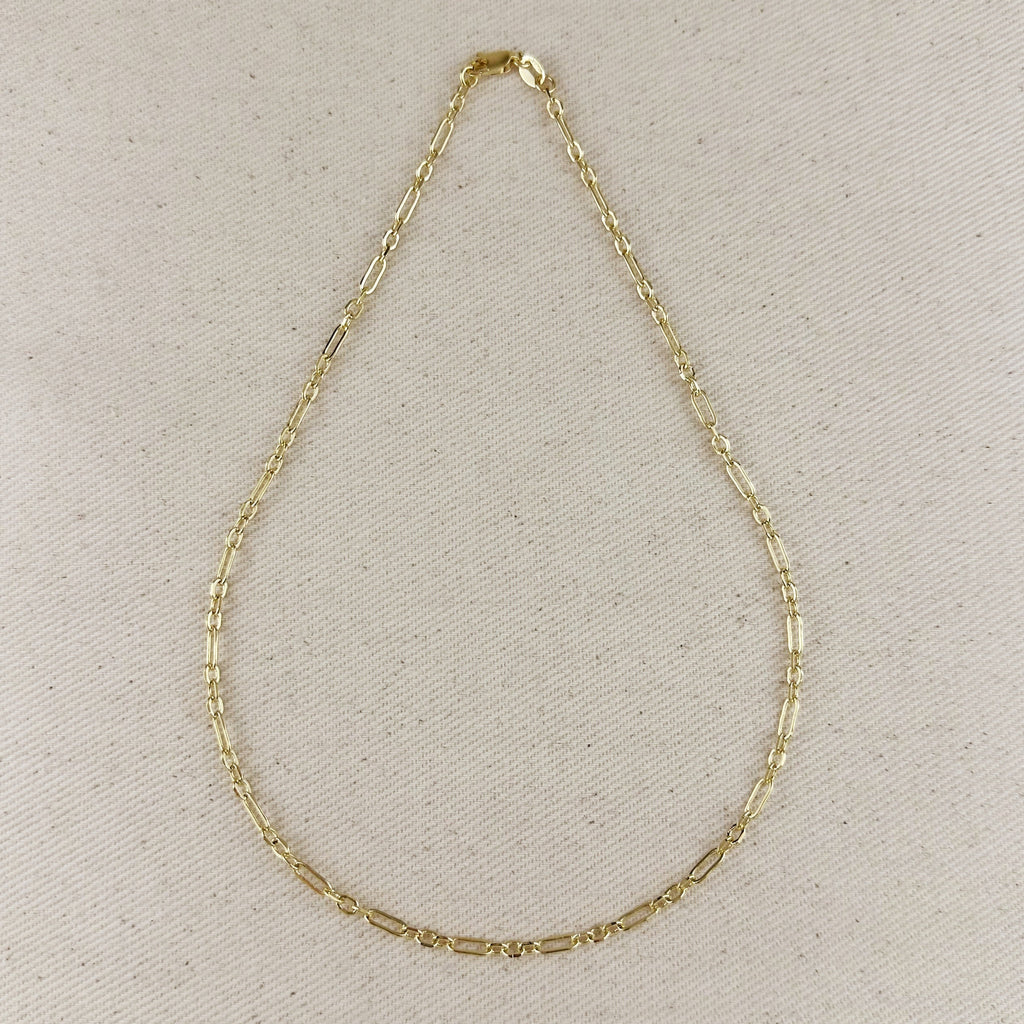 18k gold filled paperclip necklace with 3x1 link pattern on a neutral background.