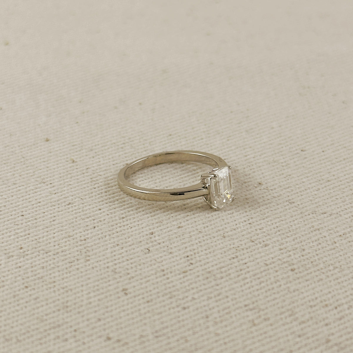 .925 Sterling Silver Rhodium Plated Moissanite Emerald Cut Solitaire Ring