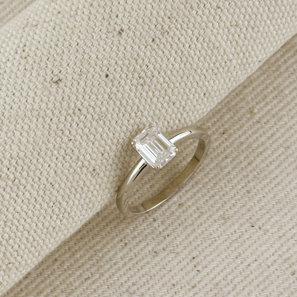 .925 Sterling Silver Rhodium Plated Moissanite Emerald Cut Solitaire Ring