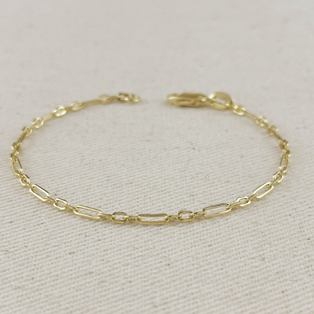 Delicate 18K gold filled 2.1mm paperclip bracelet showcasing a 3x1 alternated link pattern.