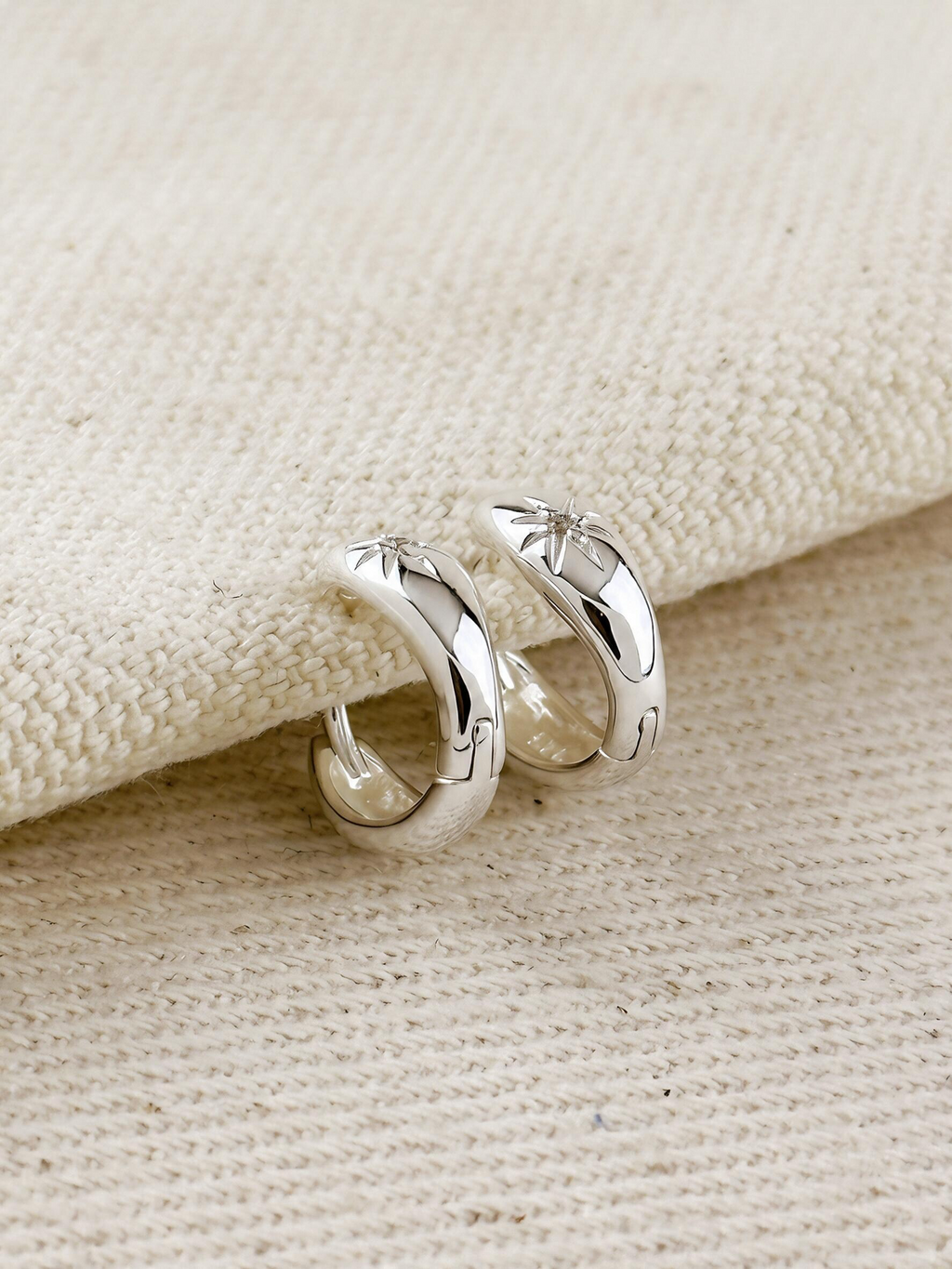 .925 Sterling Silver Starburst Huggie Earrings