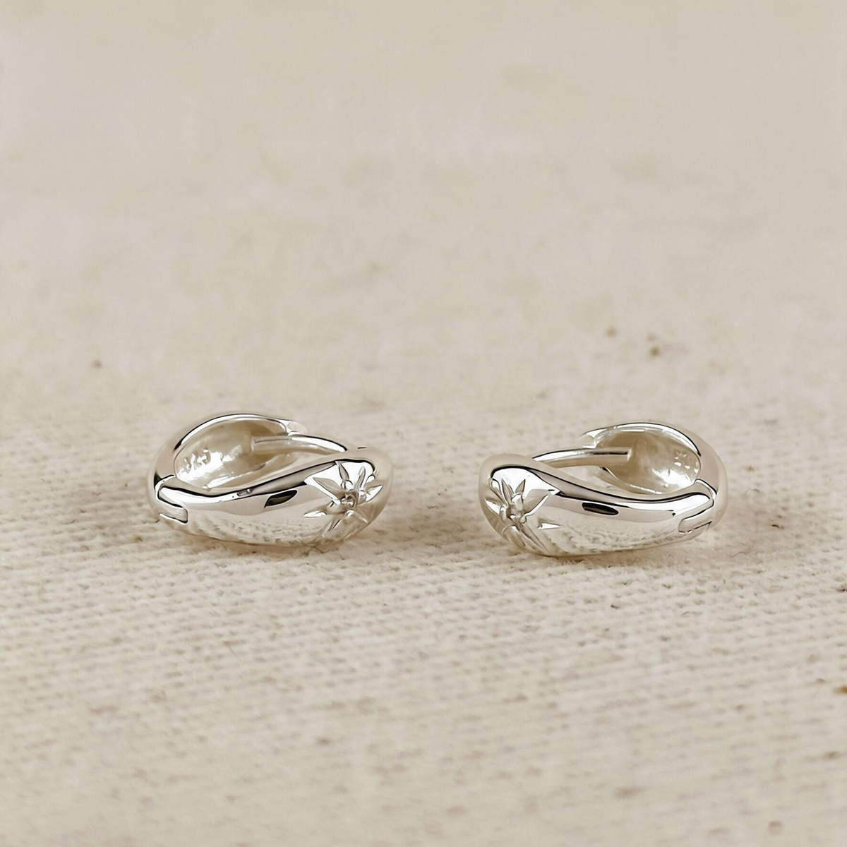 .925 Sterling Silver Starburst Huggie Earrings