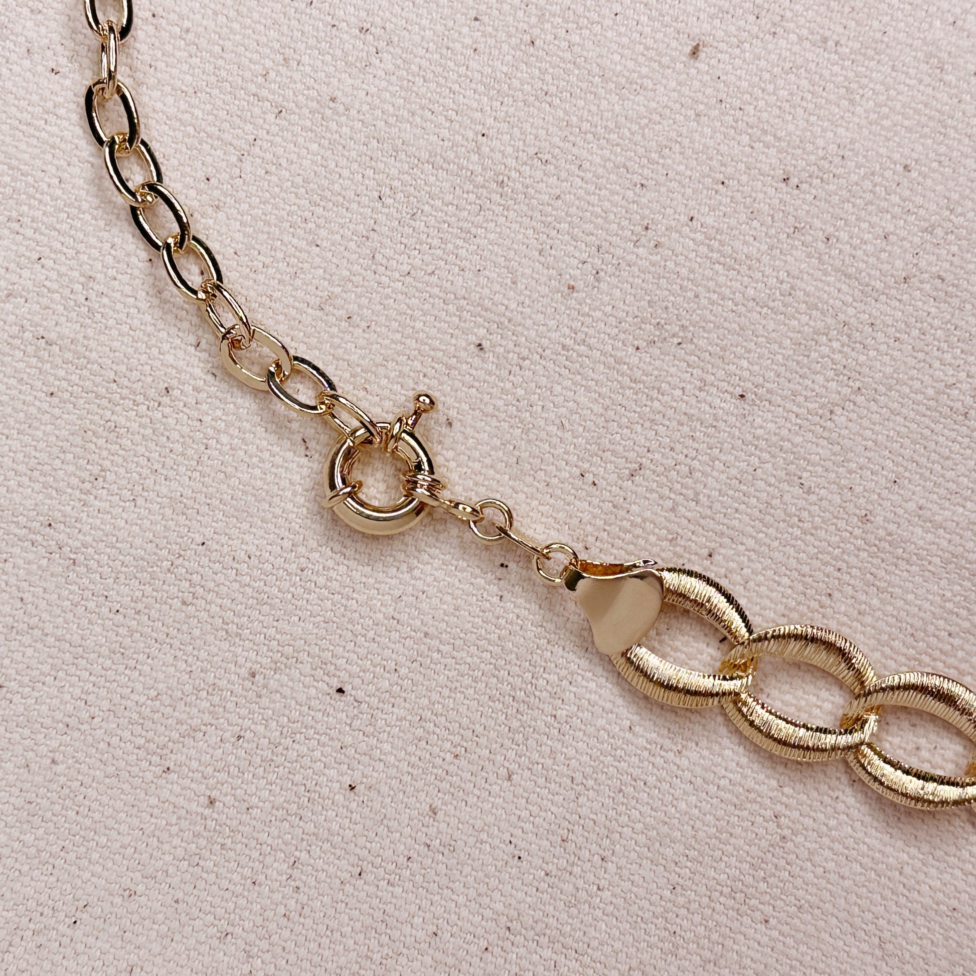 gold-filled bracelet featuring large spring clasp with curb extension